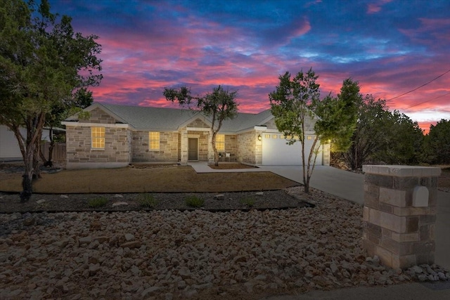 ranch-style home with a garage