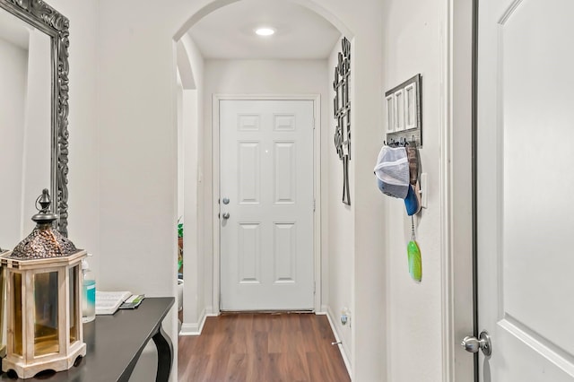 hallway featuring dark hardwood / wood-style flooring