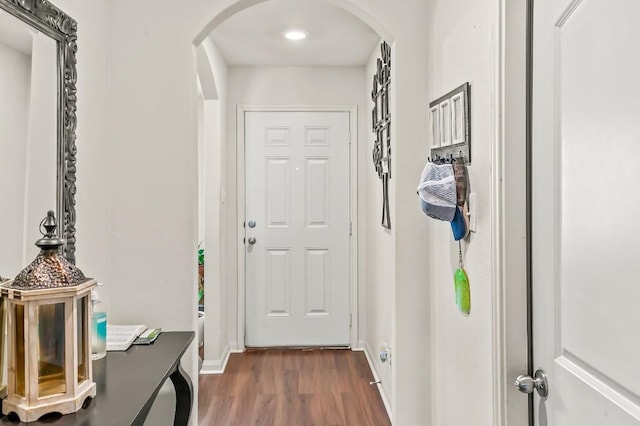 4004 Cressler Ln Unit 10F, Jarrell, TX 76537 - doorway featuring arched walkways and dark wood-style floors