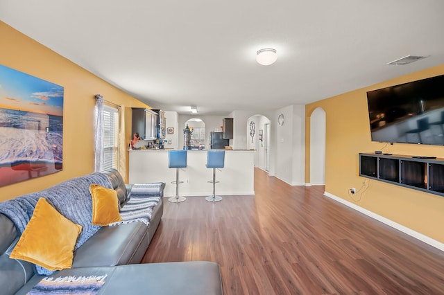 living room with hardwood / wood-style floors