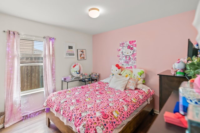 bedroom featuring wood-type flooring