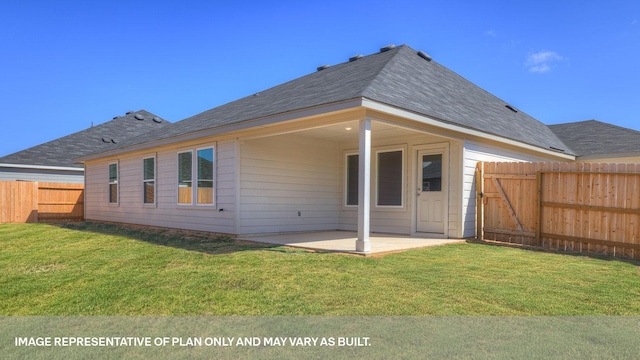 back of property with a lawn and a patio