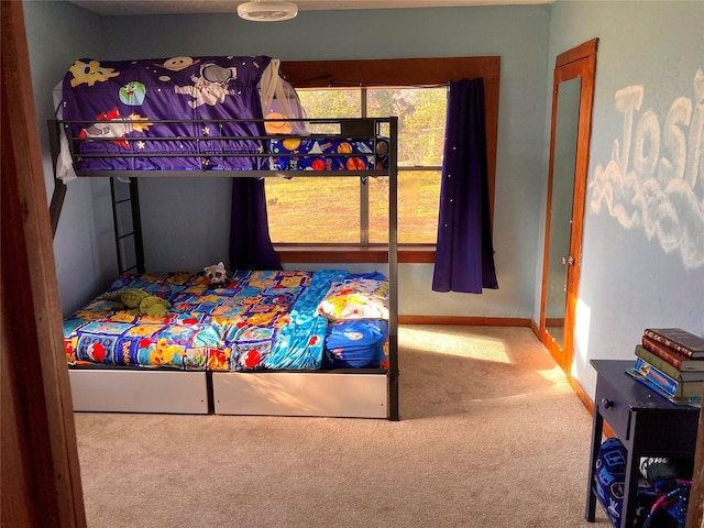 bedroom featuring carpet flooring