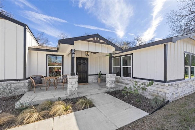 6003 Libyan Dr, Austin, TX 78745 - view of front of property featuring board and batten siding and covered porch