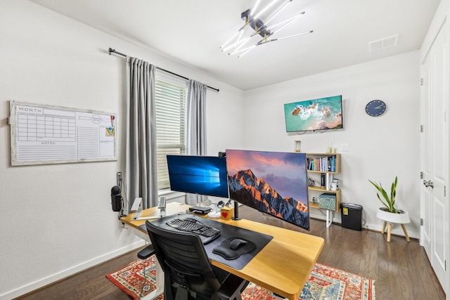 home office with dark wood-type flooring