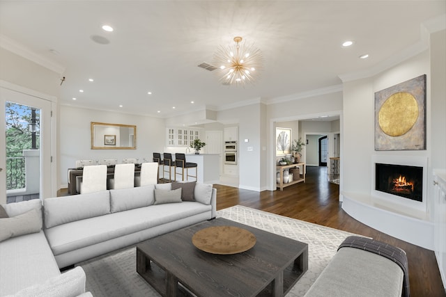 living room with crown molding, recessed lighting, dark wood-style floors, and visible vents