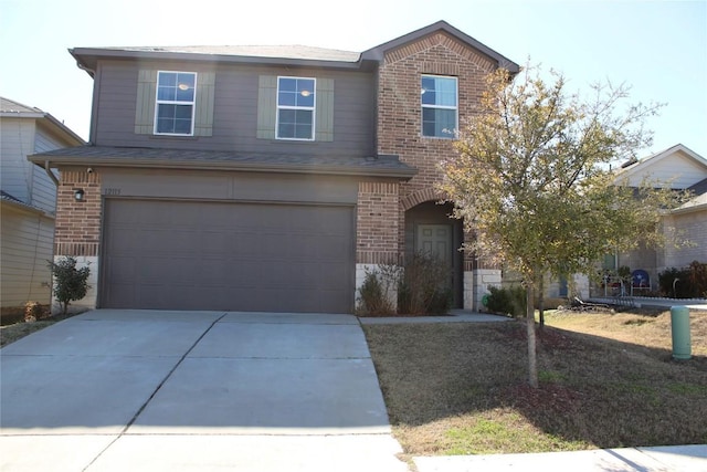 front of property with a garage