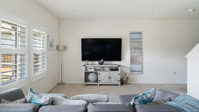 living room featuring light colored carpet