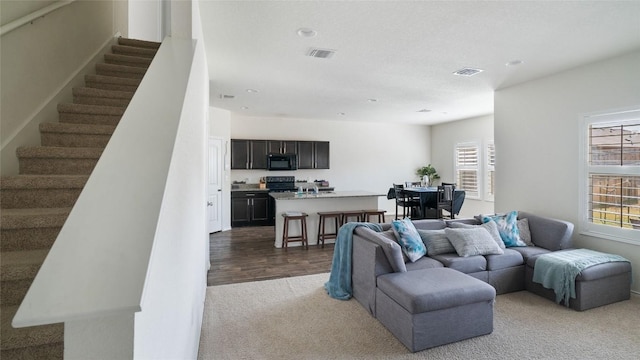 living room with carpet flooring