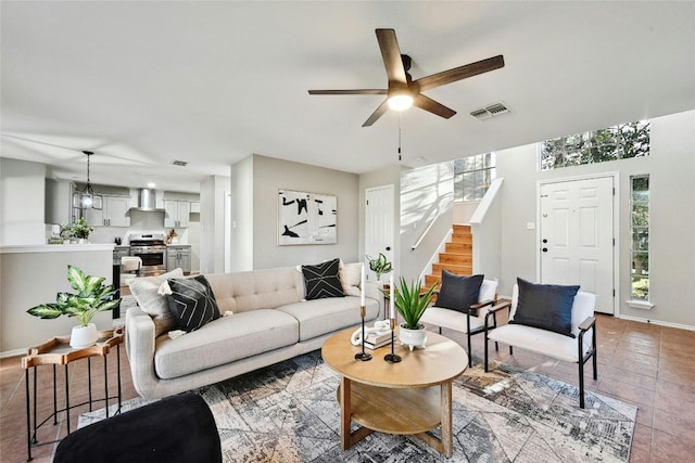 9504 Sanford Dr, Austin, TX 78748 - living room featuring stairs and ceiling fan