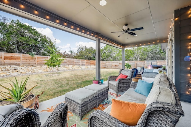 view of patio with ceiling fan and outdoor lounge area