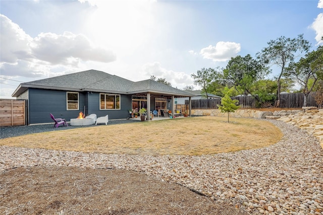 back of property with a patio area