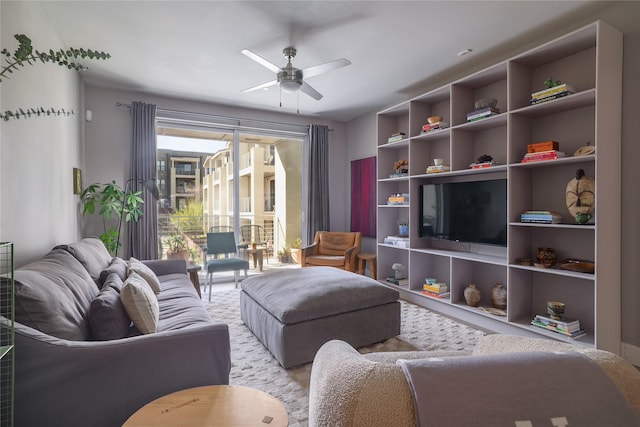 living room with ceiling fan