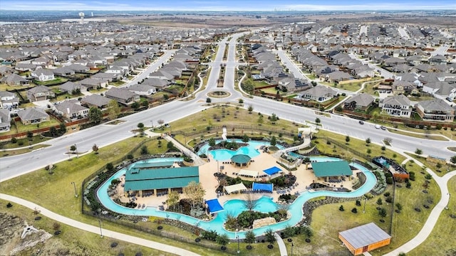 488 Pepperbark Loop, Buda, TX 78610 - view of property location with a pool and nearby suburban area