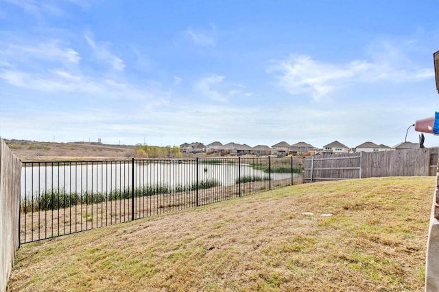 488 Pepperbark Loop, Buda, TX 78610 - view of yard with a water view and a residential view