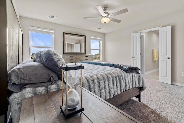 488 Pepperbark Loop, Buda, TX 78610 - bedroom featuring baseboards, ceiling fan, and carpet flooring