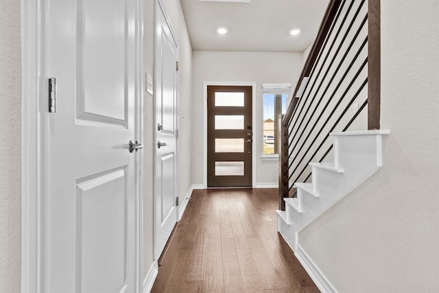 foyer featuring dark hardwood / wood-style floors