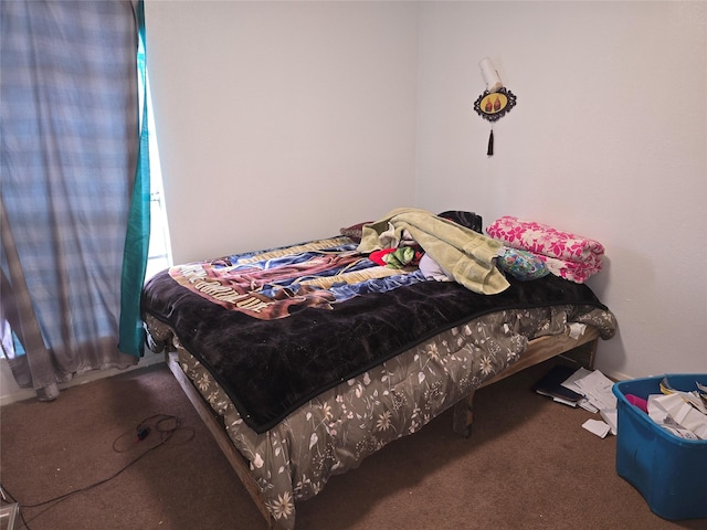 bedroom featuring carpet