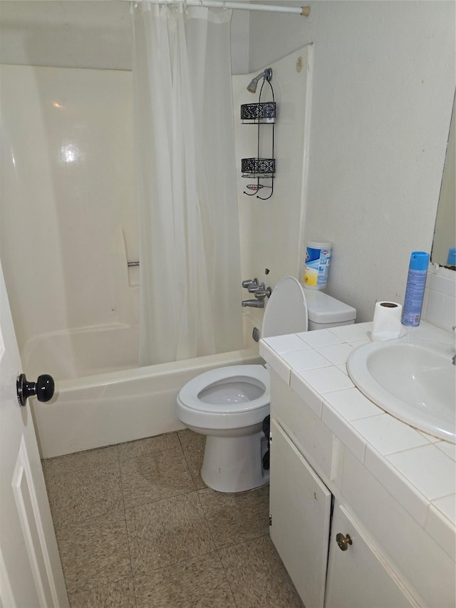 full bathroom featuring toilet, vanity, and shower / tub combo