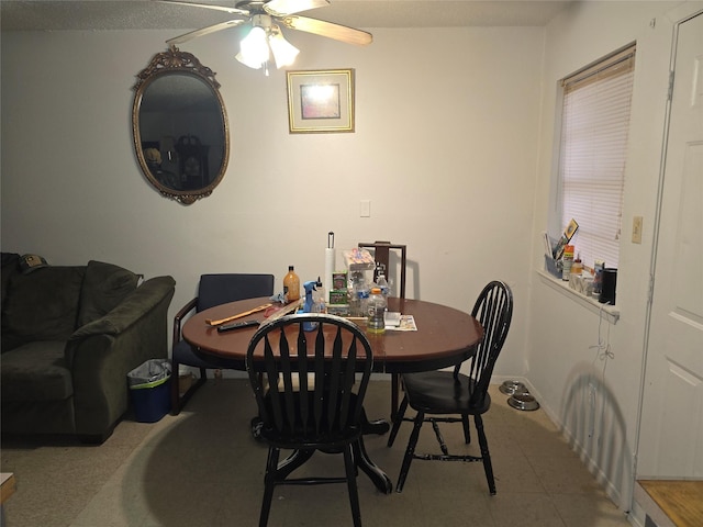 dining area featuring ceiling fan