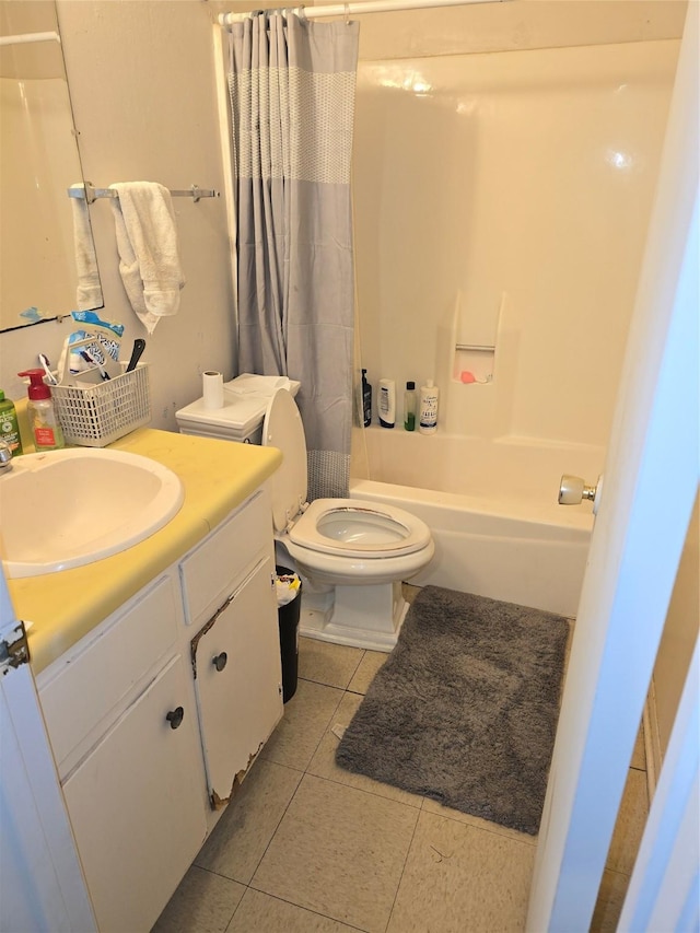 full bathroom with vanity, toilet, shower / bathtub combination with curtain, and tile patterned flooring