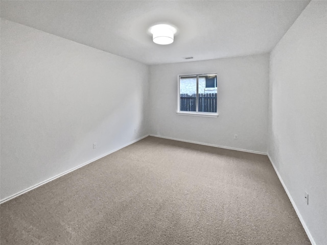 empty room with carpet flooring