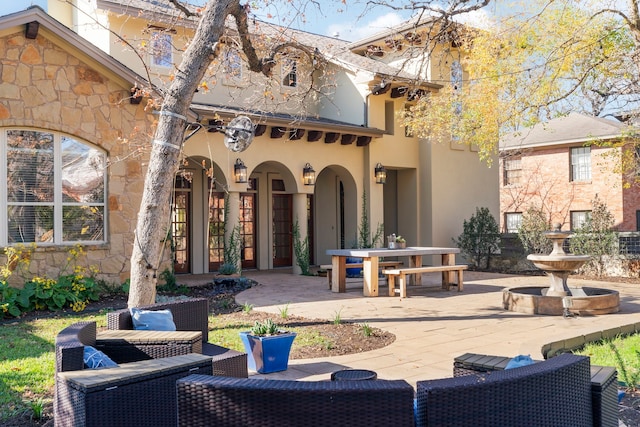 rear view of house with a patio area