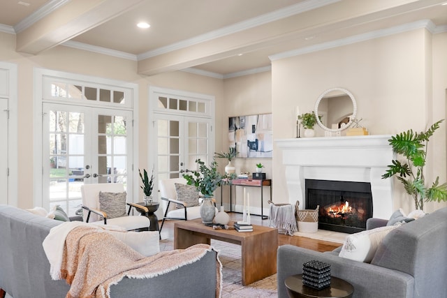 living room with beam ceiling, french doors, and ornamental molding