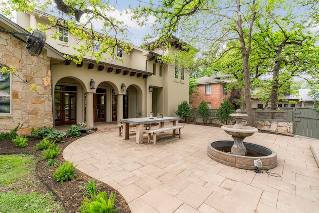 2407 Enfield Rd Unit A, Austin, TX 78703 - view of patio featuring french doors and a gate