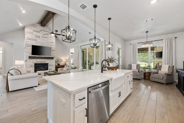 210 Miranda Way, Georgetown, TX 78633 - kitchen featuring stainless steel dishwasher, open floor plan, a chandelier, and recessed lighting
