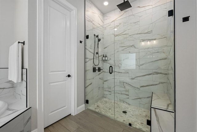 210 Miranda Way, Georgetown, TX 78633 - full bath with a marble finish shower and wood finished floors