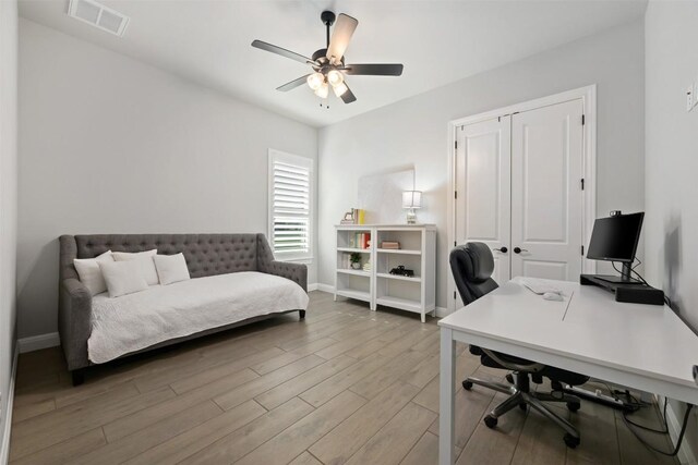 210 Miranda Way, Georgetown, TX 78633 - office area with light wood finished floors and ceiling fan