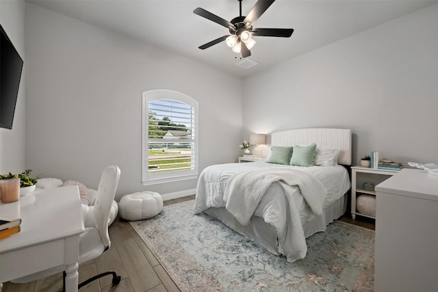 210 Miranda Way, Georgetown, TX 78633 - bedroom featuring wood finished floors, ceiling fan, and baseboards