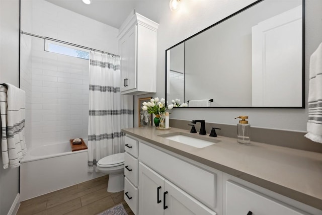 210 Miranda Way, Georgetown, TX 78633 - full bathroom with vanity, shower / tub combo, and wood finished floors