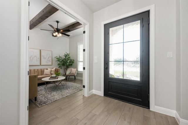 210 Miranda Way, Georgetown, TX 78633 - entrance foyer with light wood-type flooring, beam ceiling, and ceiling fan