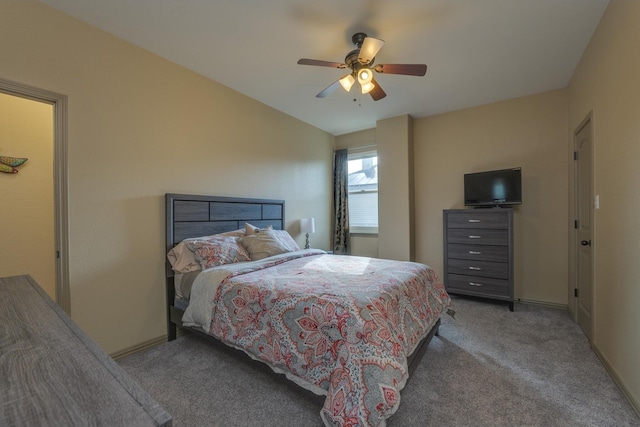 bedroom with carpet, a ceiling fan, and baseboards