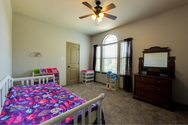 bedroom with carpet flooring, a ceiling fan, and radiator