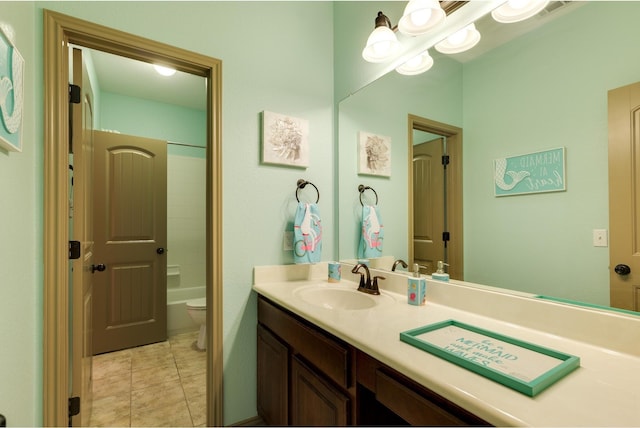 full bathroom with vanity, washtub / shower combination, tile patterned floors, and toilet