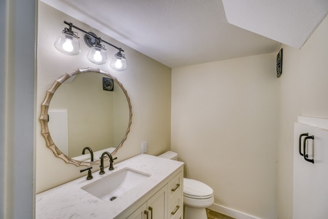 614 E Briarway Dr, Granite Shoals, TX 78654 - half bath featuring toilet, a textured ceiling, and vanity