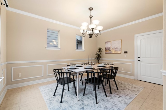 tiled dining area featuring ornamental molding and a chandelier