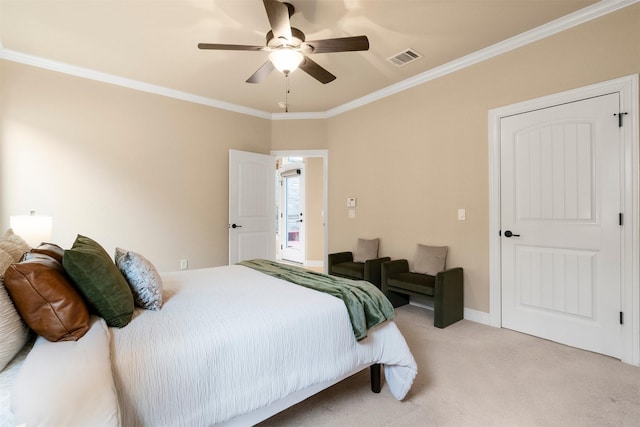 carpeted bedroom with crown molding and ceiling fan