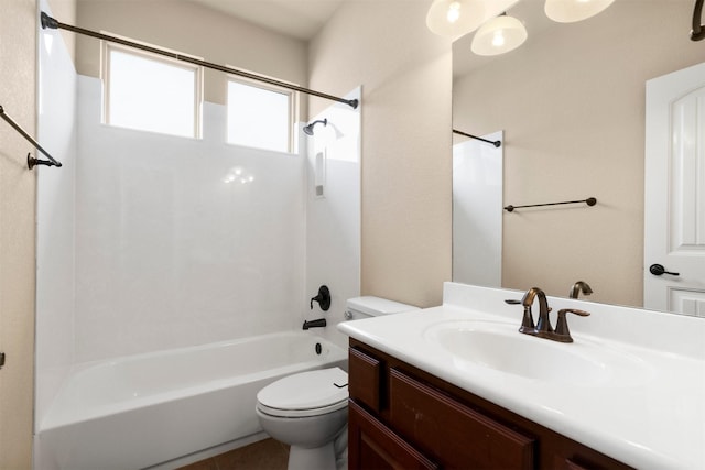 full bathroom featuring vanity,  shower combination, and toilet