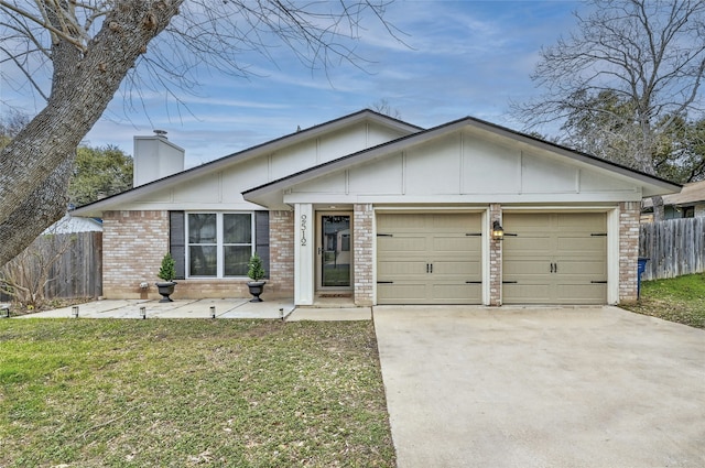 ranch-style home featuring a garage and a front yard