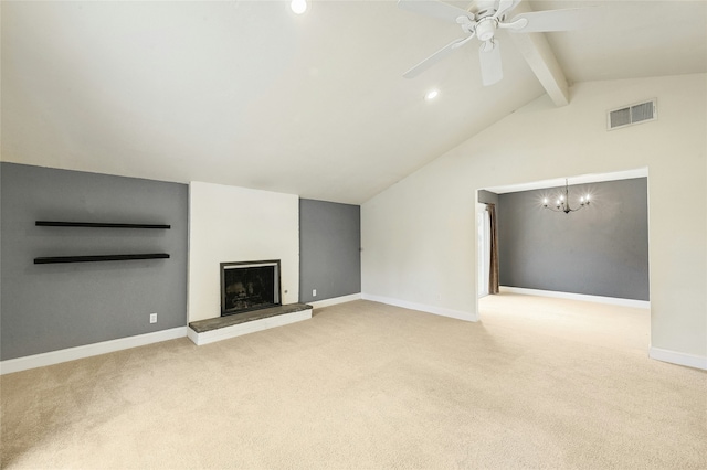 unfurnished living room featuring lofted ceiling with beams, ceiling fan with notable chandelier, and carpet floors