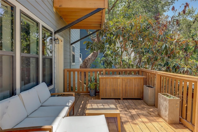 wooden deck with outdoor lounge area