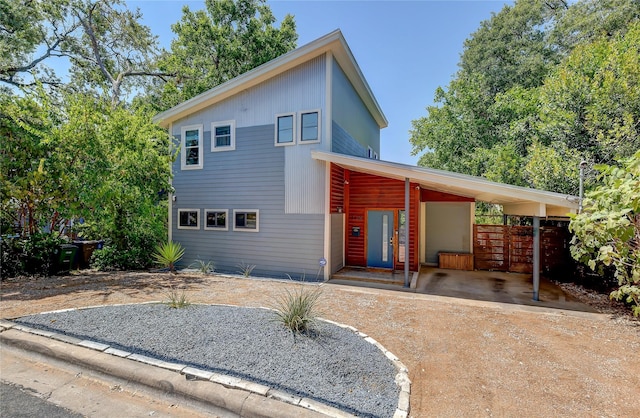 view of front of property with a carport