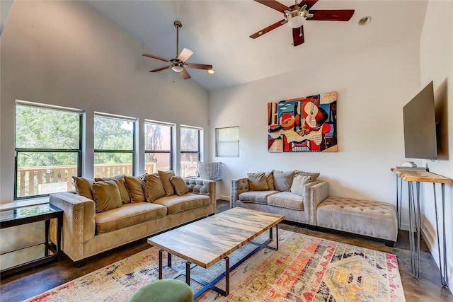 living room with high vaulted ceiling and ceiling fan