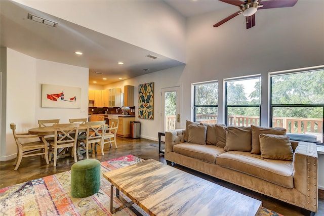 living room featuring ceiling fan