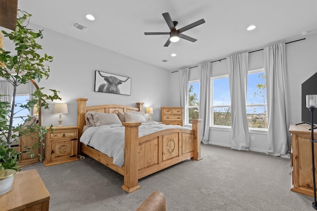 carpeted bedroom featuring ceiling fan