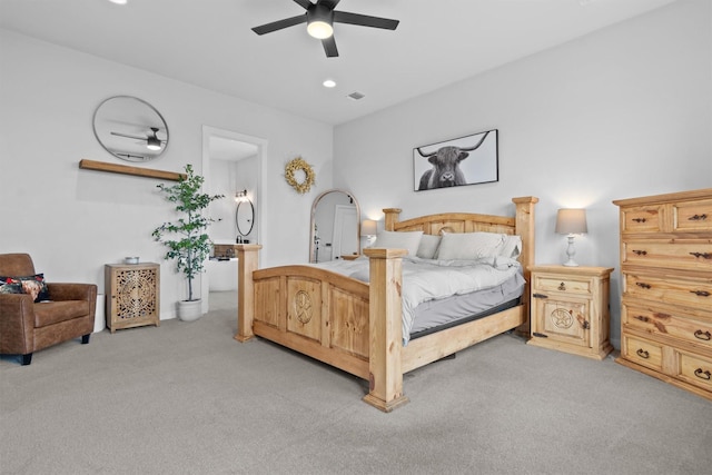 bedroom featuring light carpet and ceiling fan